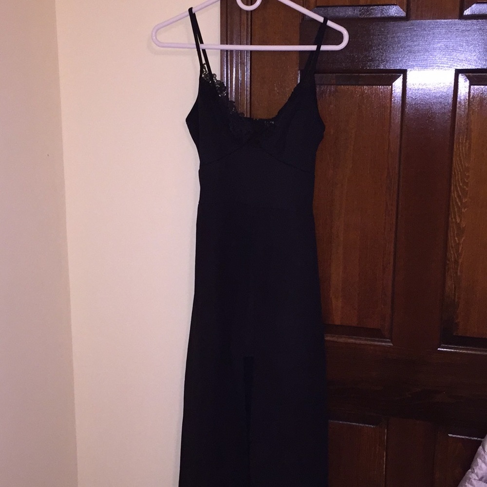 Long black romper size M.